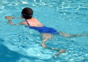 Woman swimming breaststroke